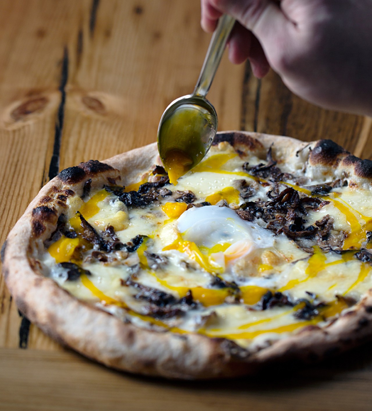 The "Donald" is a wood-fired pizza with wild mushrooms, duck egg and truffles.