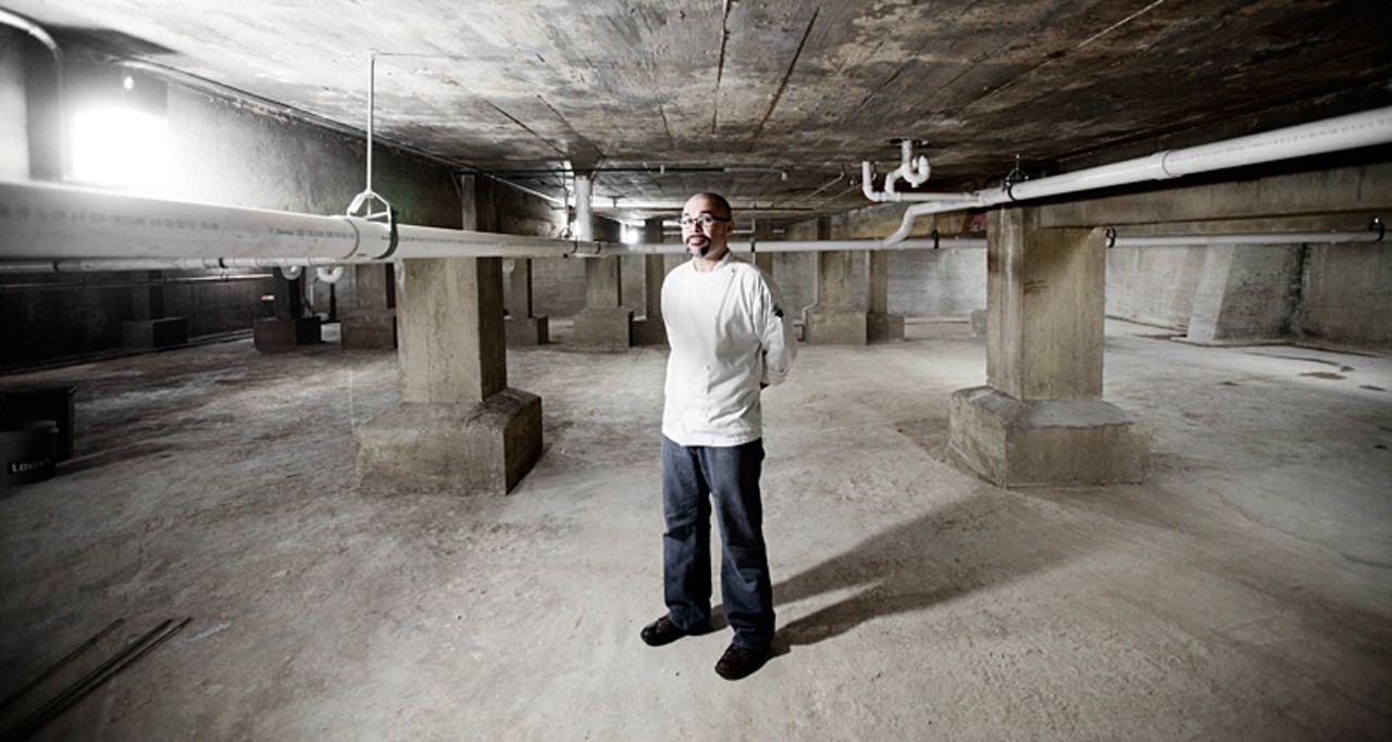 Chef Chris Lee in the basement of the large former St. Charles Municipal Water Works building that now houses Hendricks BBQ.
