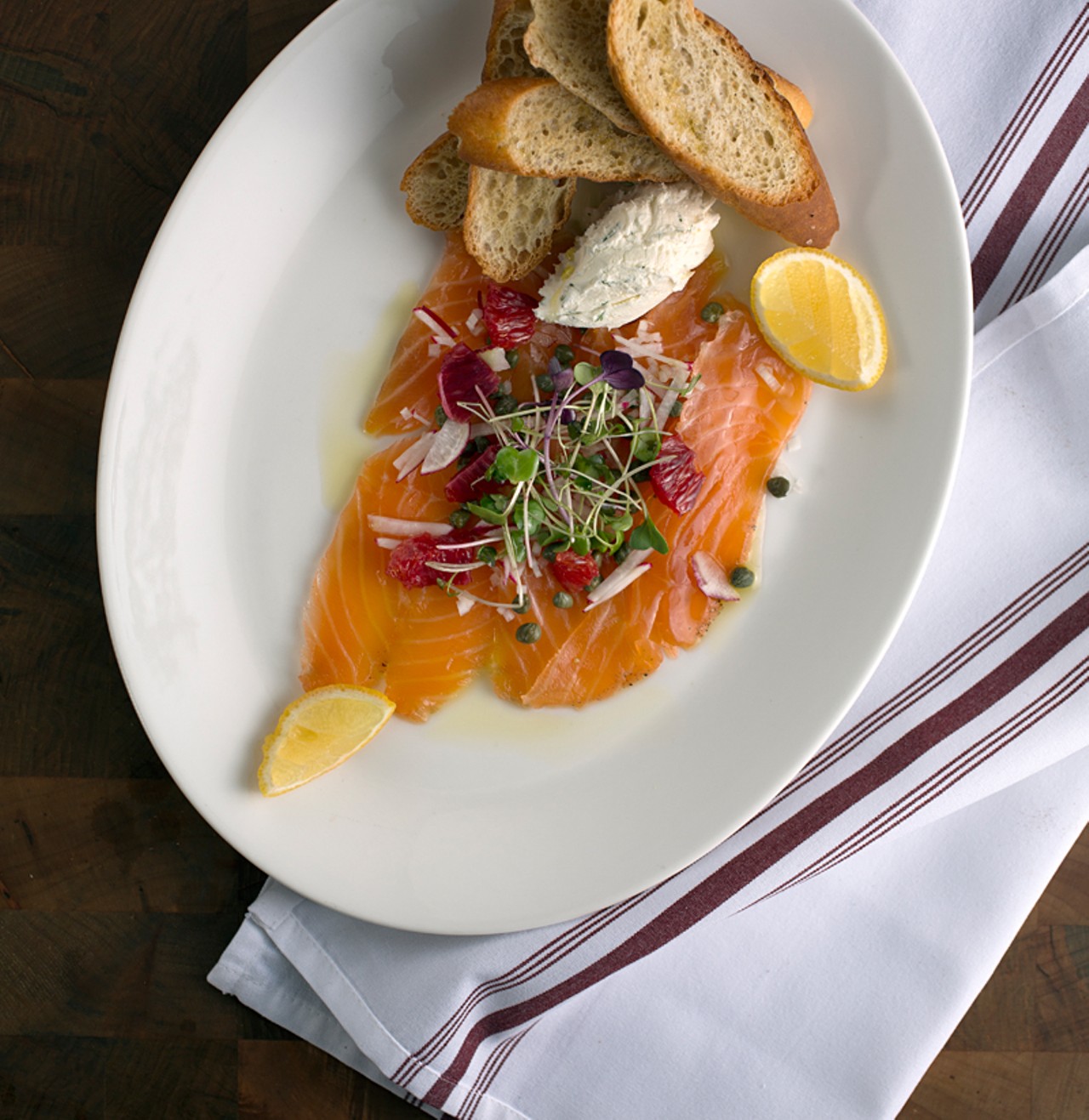 House-smoked Salmon with dill-citrus mascarpone, capers, crostini.