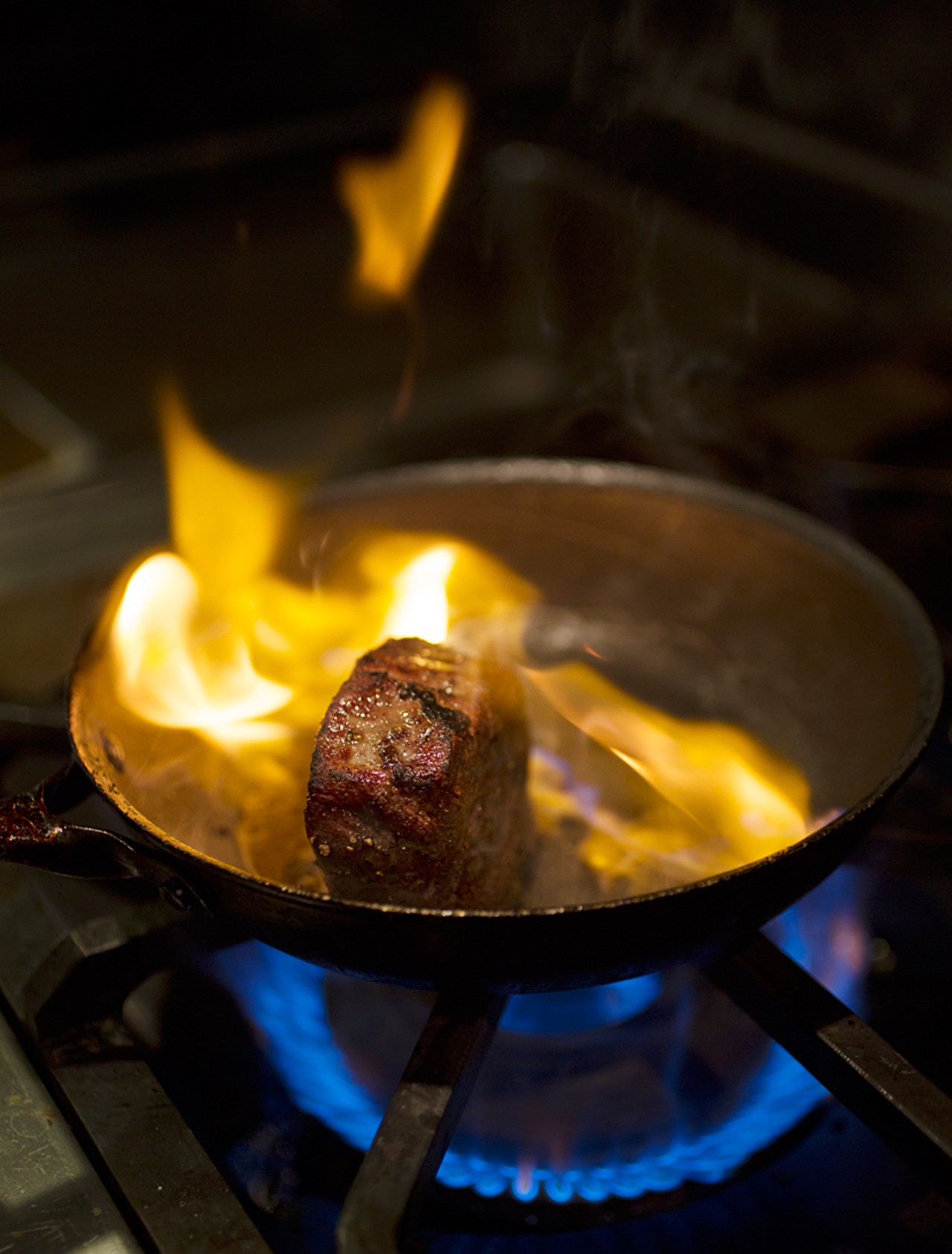 Cooking the filet mignon.