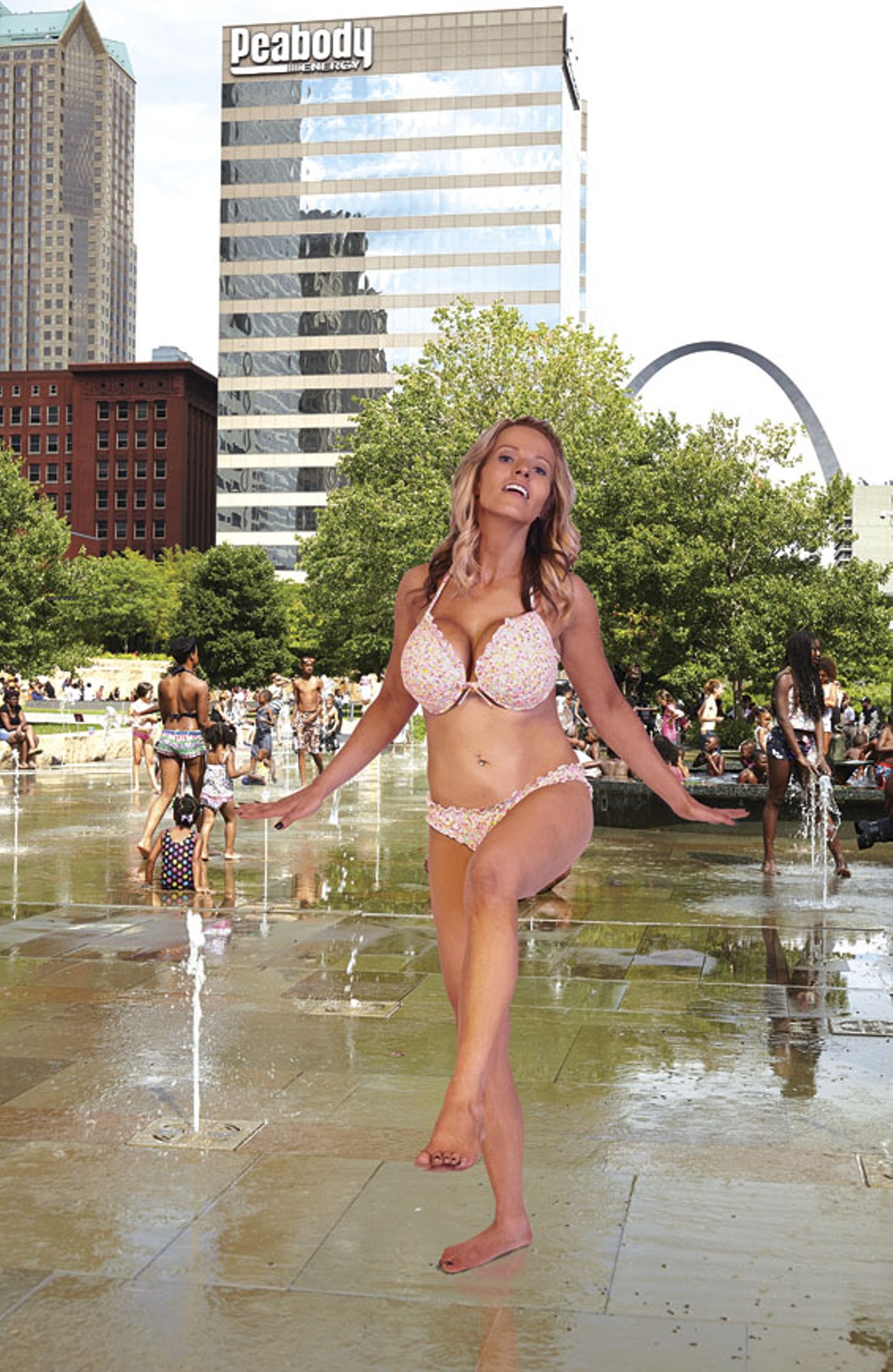 Adults aren't supposed to "lounge" in Citygarden's splash pool, so Rachel must frolic instead in the park's spray plaza. It is open to all &mdash; even dogs.