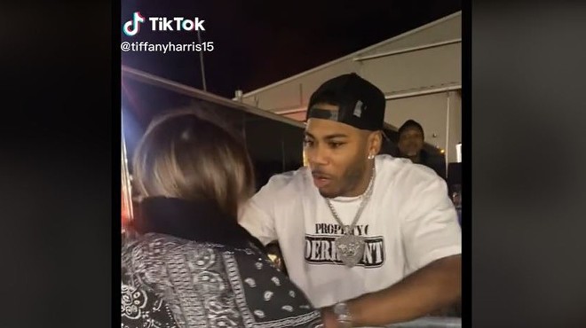 It Was Cold Out Therre, So Nelly Took Off His Jacket for a Fan