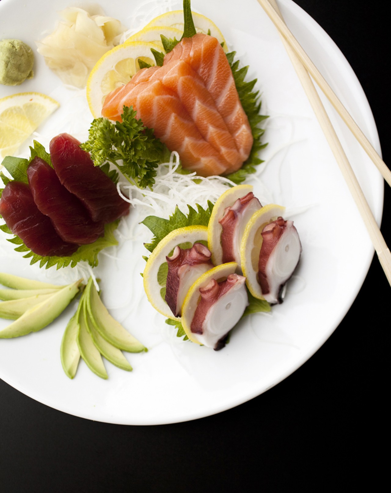 Sashimi of octopus, tuna and salmon.