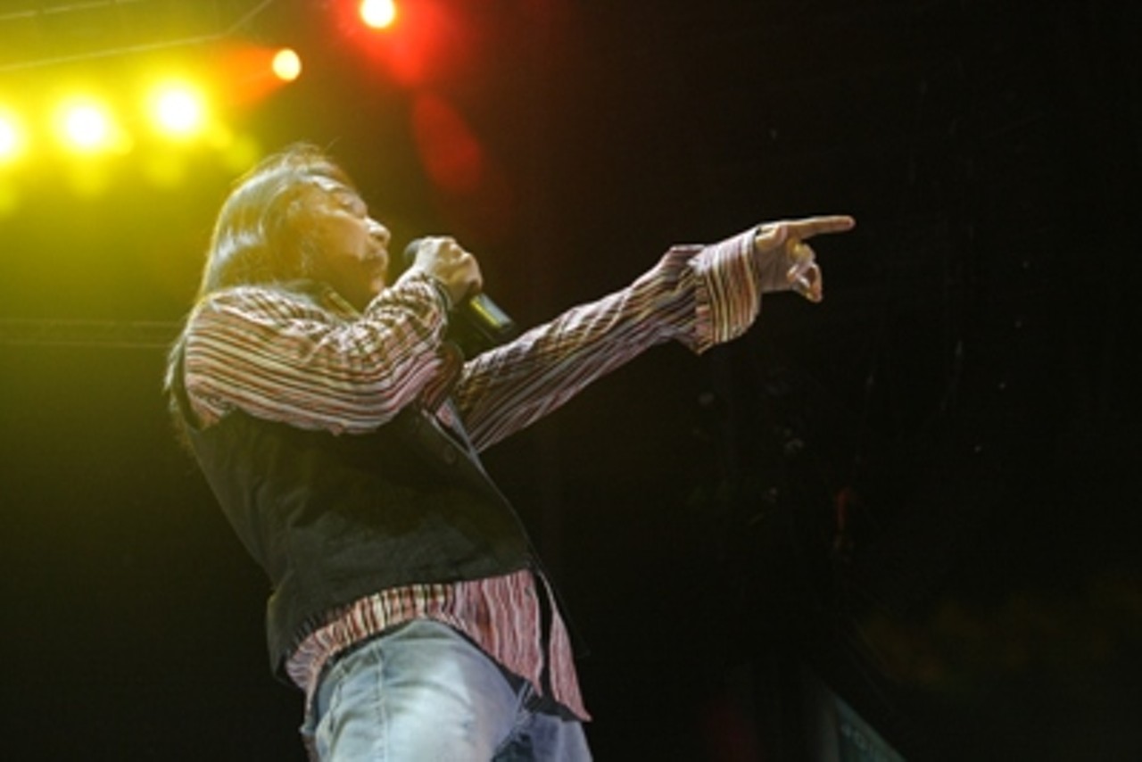 Arnel Pineda sings for Journey on September 13, 2008 at Verizon Wireless Amphitheater in Maryland Heights, Missouri.