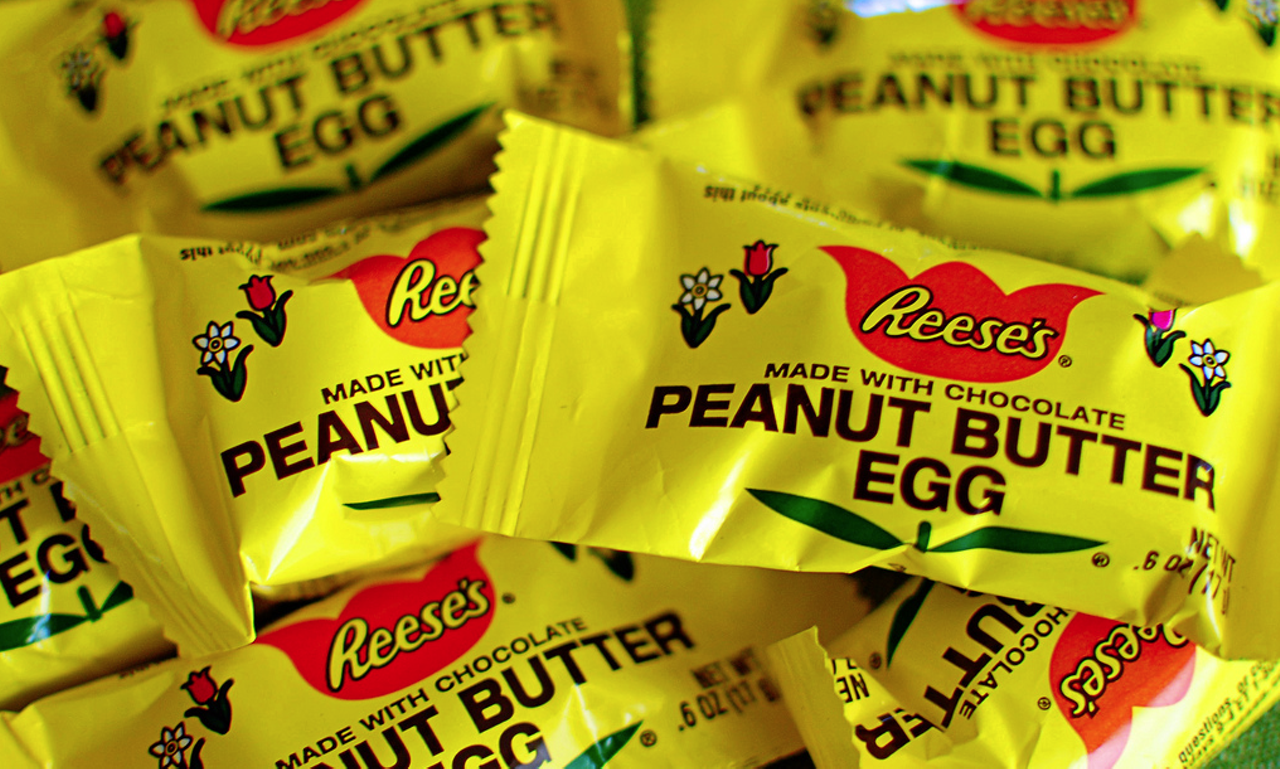 The Best
Reese's Peanut Butter Eggs
Reese's peanut butter cups are a year-round favorite. That's just a fact. There is just something special about salty, sweet peanut butter and its meant-to-be marriage with Reese's creamy milk chocolate always within reach near the check-out lane. Gut Check, however, would argue that the seasonal Reese's peanut butter egg is better than the classic peanut butter cup. Wait, we'll explain.
The true magic of Reese's peanut butter eggs lie in the chocolate to peanut butter ratio. The egg shape lends to a better distribution of smooth peanut butter encased by rich milk chocolate. The peanut butter core is thicker, housed by a perfectly thin layer of delectable chocolate. There is also something more mystifying and alluring about the short-term, seasonal availability of Reese's eggs that almost challenges, nay begs, us to buy as many as possible before they disappear from shelves for another calendar year.
