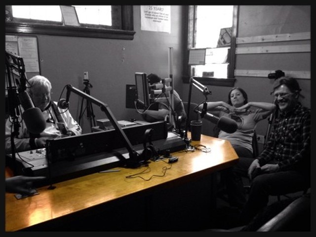 In happier days, KDHX programmers and musicians shared a laugh at the station's old home on Magnolia.