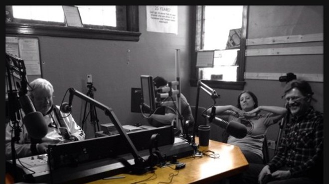 In happier days, KDHX programmers and musicians shared a laugh at the station's old home on Magnolia.