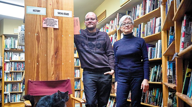 Left Bank Books co-owners Jarek Steele and Kris Kleindienst (with Spike, left) aren't just selling books. They're also creating community.