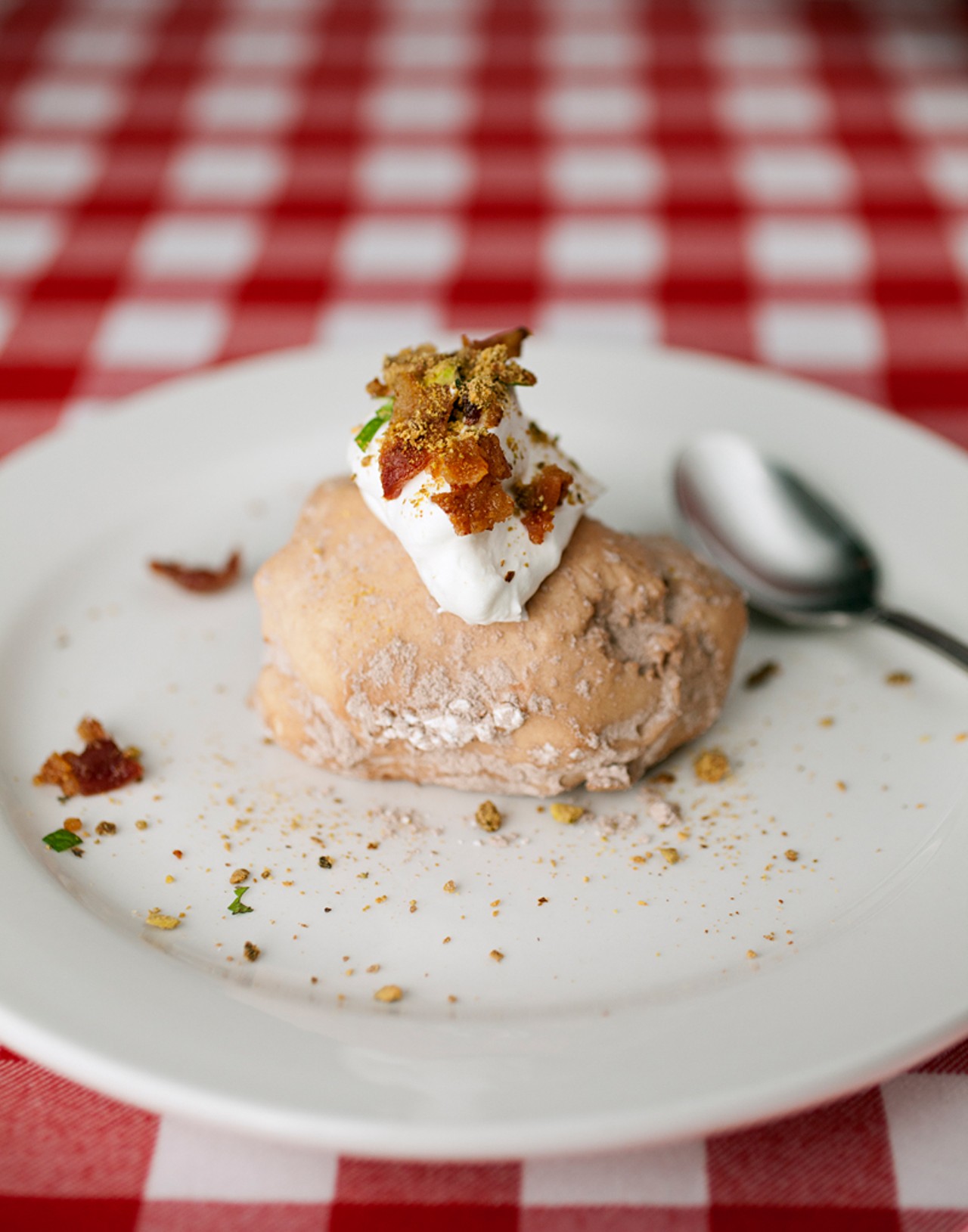One of the selections on the dessert -- or "Afterthoughts" -- menu: The Baked Potato.
The Baked Potato is vanilla bean ice cream formed to look like a potato, dusted with powdered sugar and cocoa powder. It is then topped with whipped cream, toasted pistachioes and bacon.