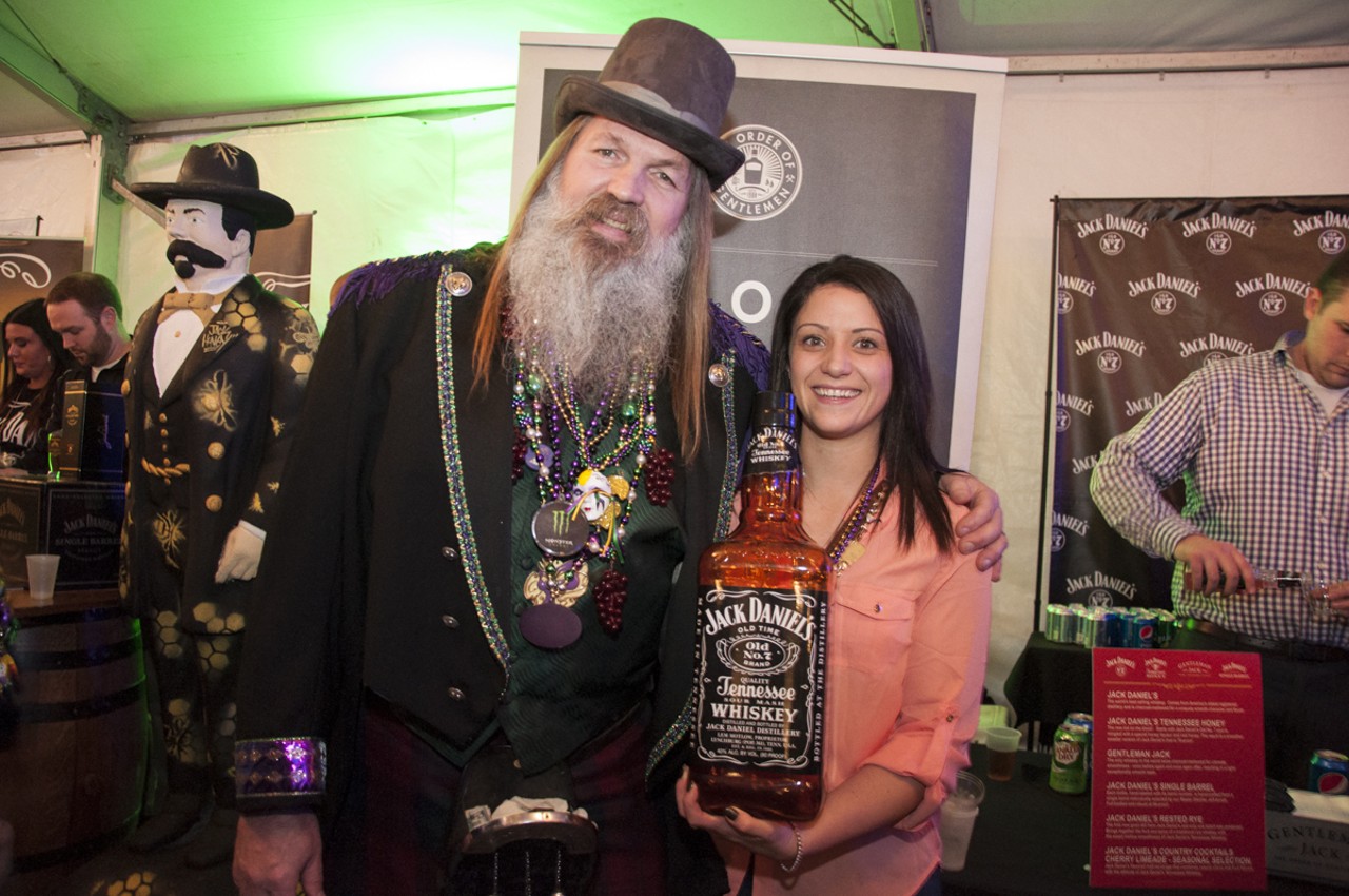 Seamus Ferguson and Gina Borelli: One larger than life and in a kilt; the other holding a larger than life bottle of Jack Daniels. If only bottles of whiskey came in that size.