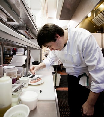 Executive Chef Jonathan Olson at work in the Market Grill Kitchen.