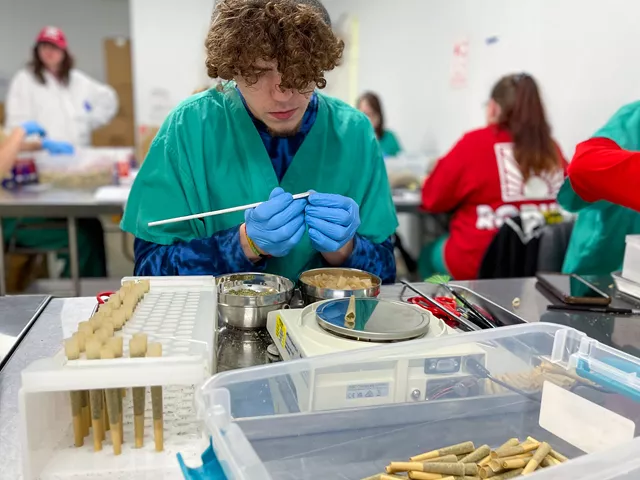 Skyler Berry makes pre-rolled joints May 2 at the Robust Cannabis production facility in Cuba, Missouri.