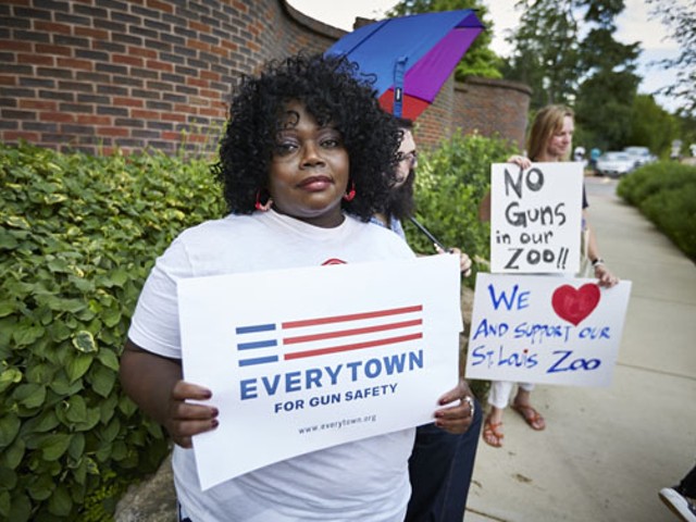 A protester outside the St. Louis Zoo