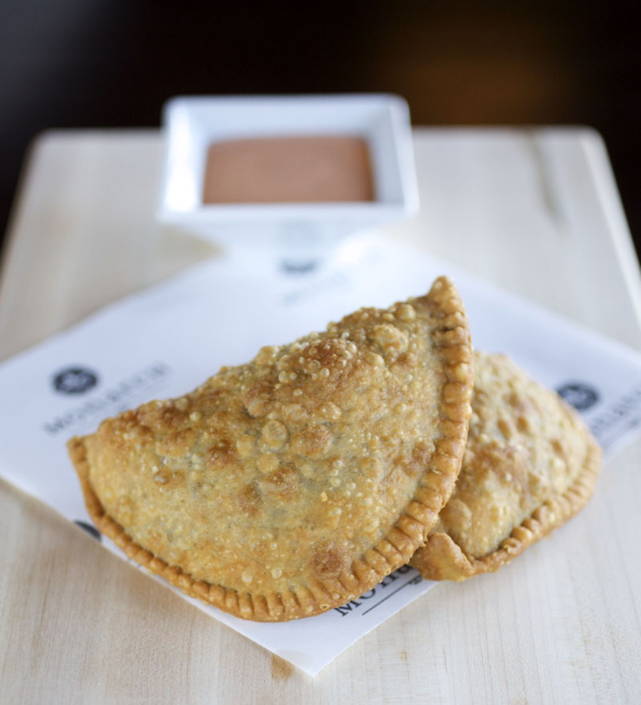 Miniature Natchitoches Meat Pies - spicy beef turnovers served with a special sauce.