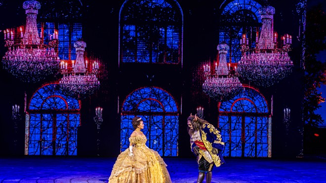The Beast (Ben Crawford) and Belle (Ashley Blanchet) in the Muny Theatre's production of Disney's Beauty and the Beast.