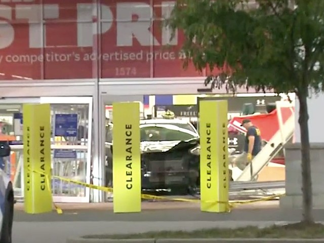 A Kia Optima smashed through the front door of an Academy Sports and Outdoors this morning in in O'Fallon, Illinois.