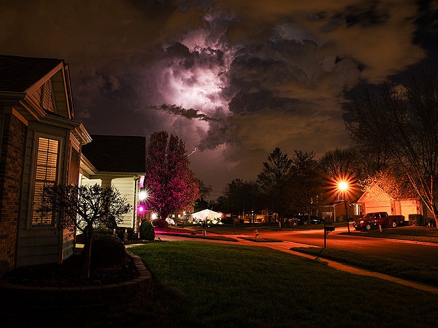 Lightning illuminates a storm cloud in Florissant on March 13, 2024.