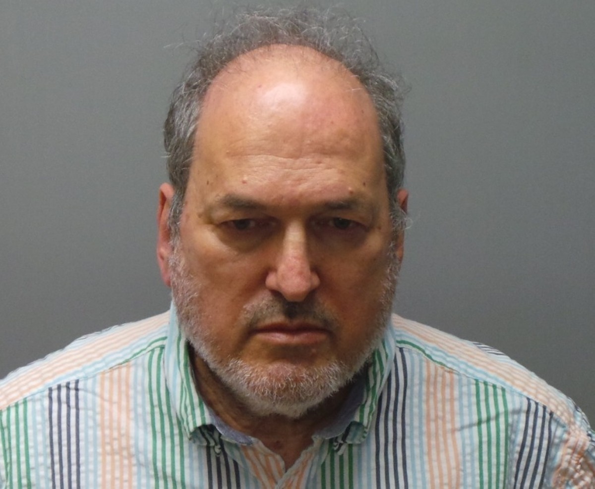 Dr. Craig Spiegel, shown in his mugshot. He remains in custody without bond.