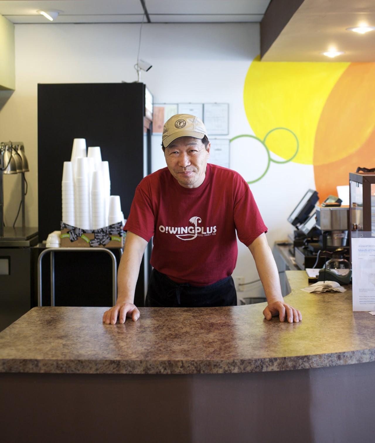Owner Steve Song behind the counter at O! Wing Plus in Overland, Missouri.