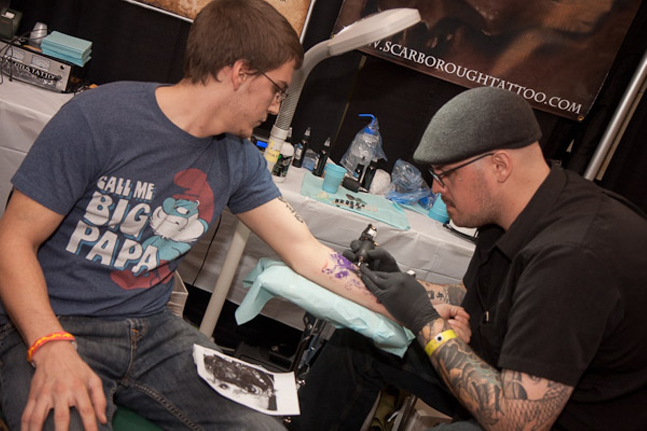 Kyle Scarborough from St. Louis Tattoo works on Bjorne Cole's Xerxes tattoo.