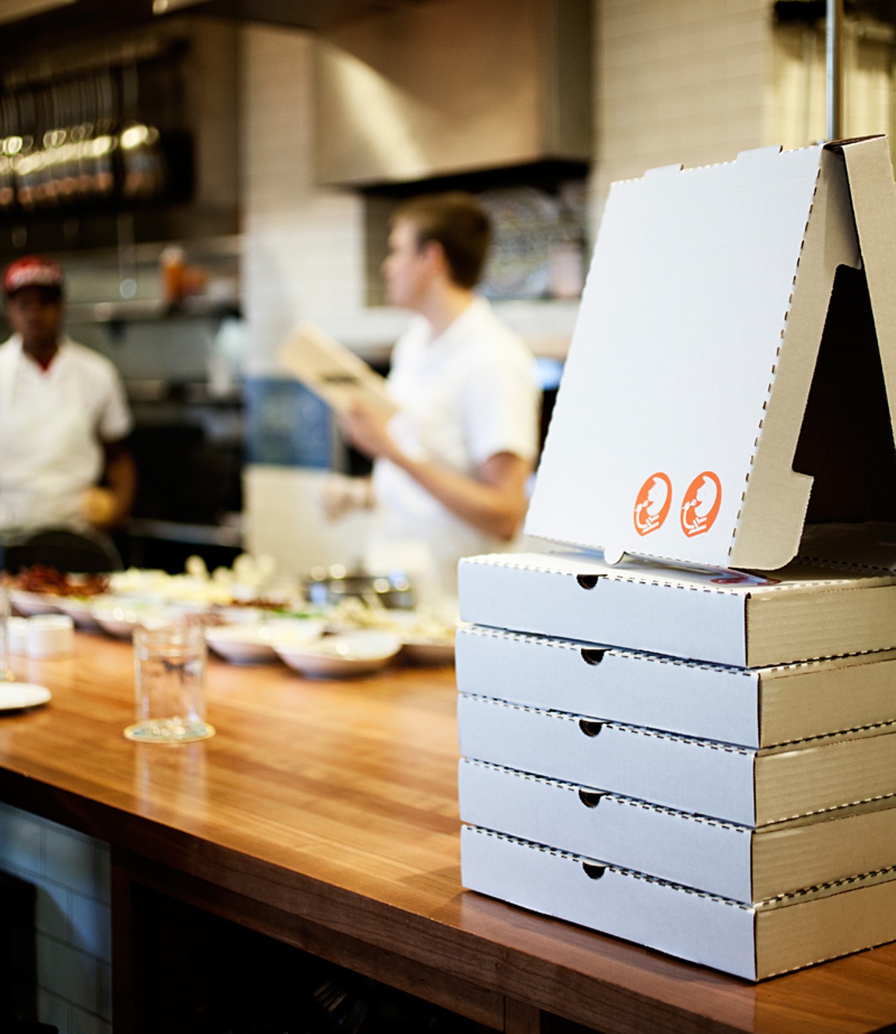 Pizza boxes, ready to go.