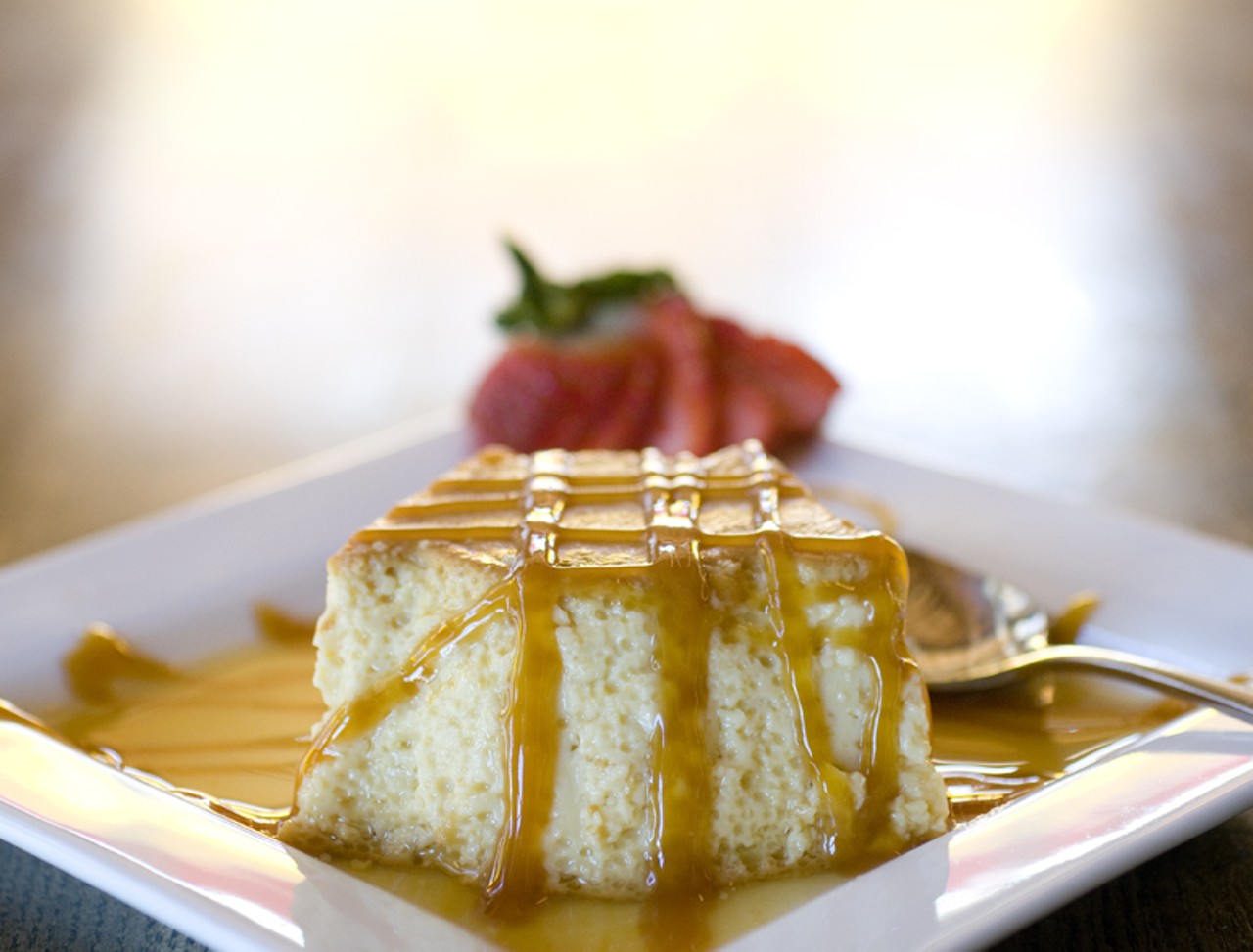 Flan: Vanilla custard made with eggs and liquor, drizzled with caramelized topping.
