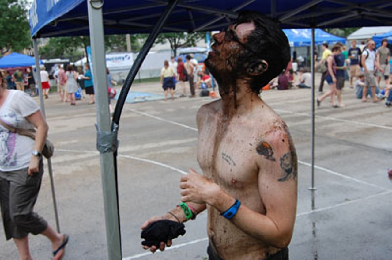 Washing off at the FUZE hydration tent.