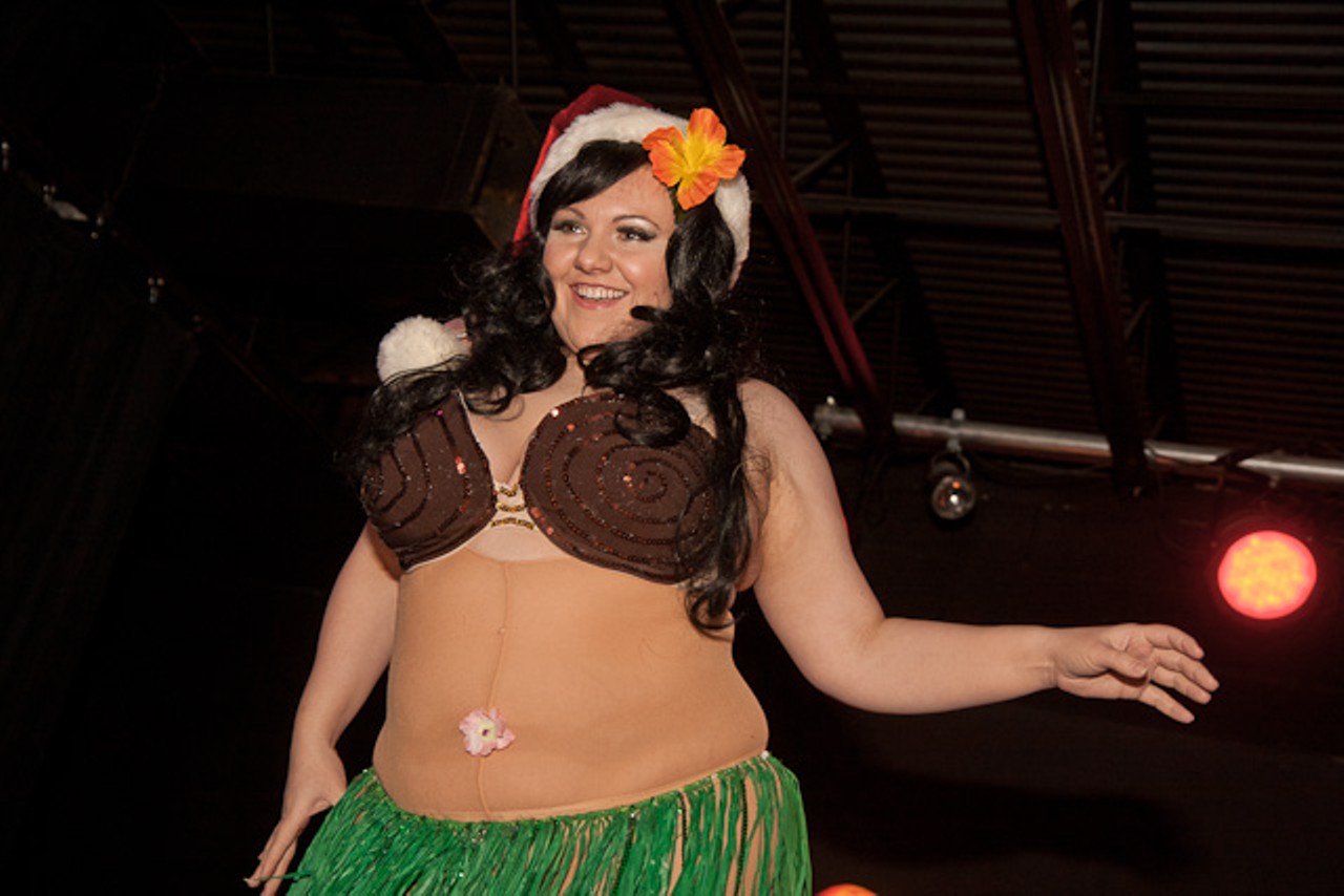 Fiona Flame performs a tropical holiday dance.