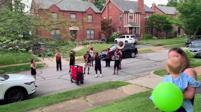 Lola gets a special birthday visit from the Red and Black Brass Band.