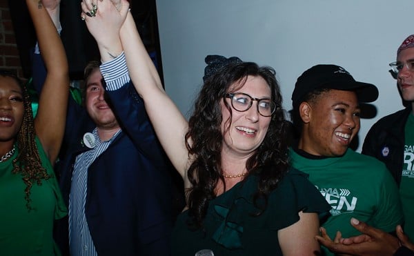 Megan Green celebrates after becoming president of the St. Louis city Board of Alderman.