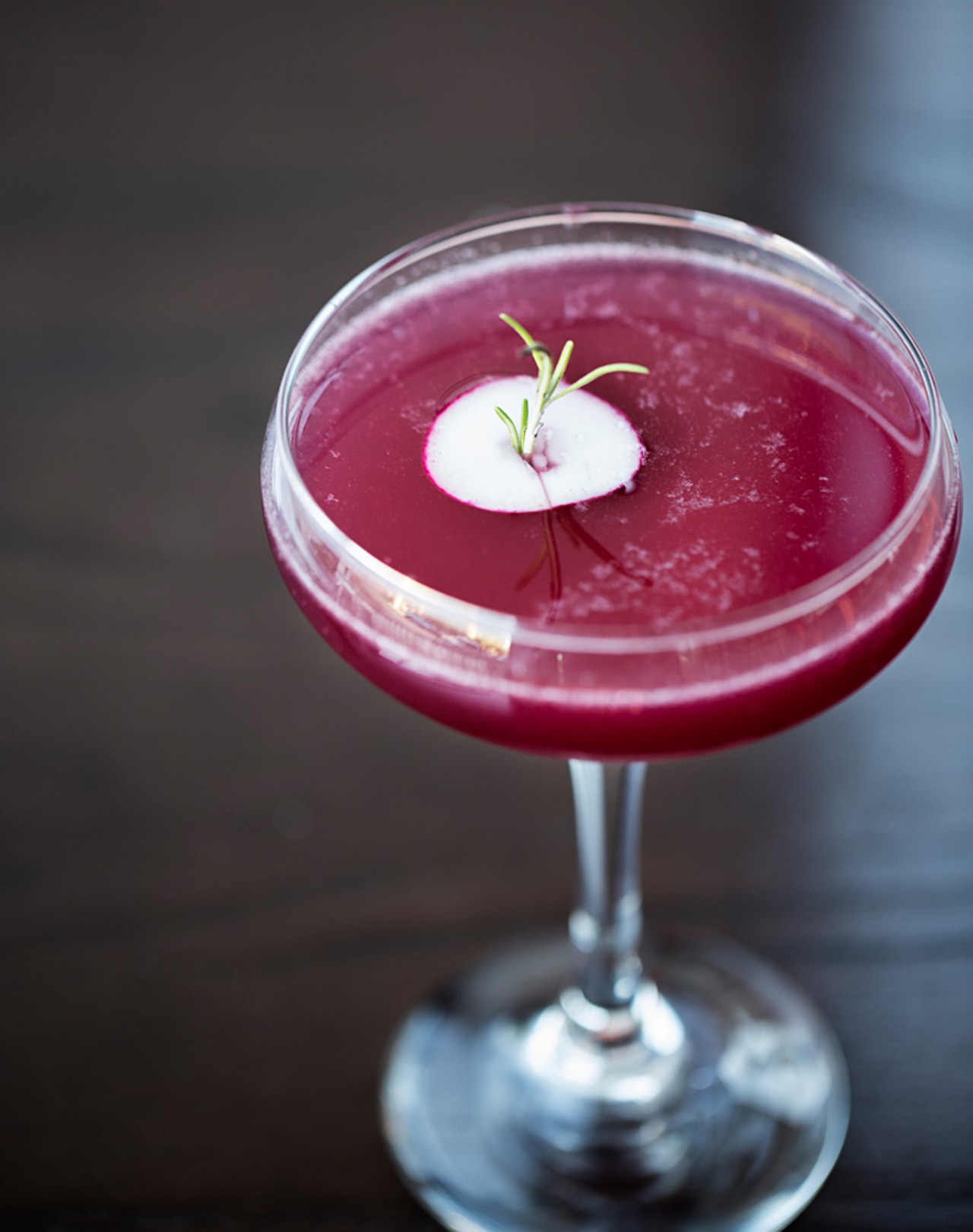 "The Roots" is made with beet syrup, ginger liqueur, aquavit, lemon & honey syrup.