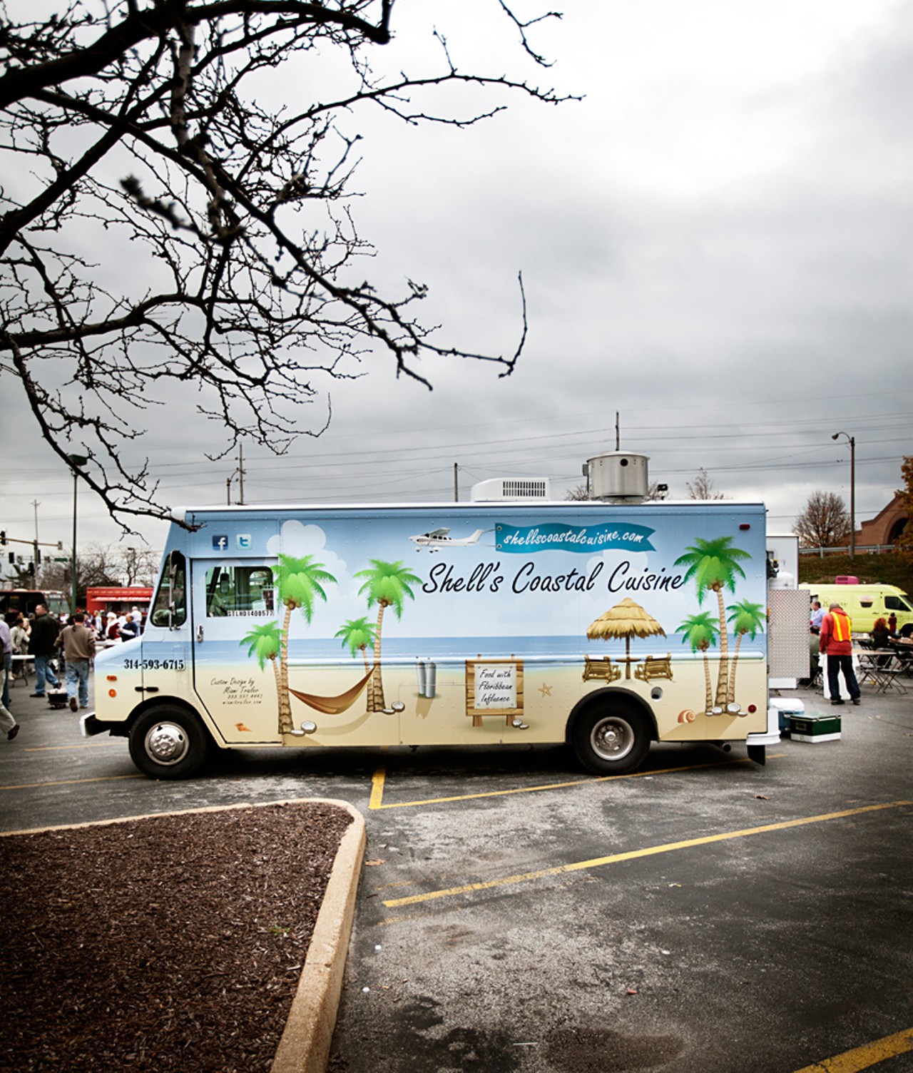 Shell's Coastal Cusine at last Saturday's Art Feast in the Crestwood Court parking Lot. Miami Trailer customized the truck for owner Shelley McMahan, inside and out. The truck had formerly been a Lance Cracker Truck.
