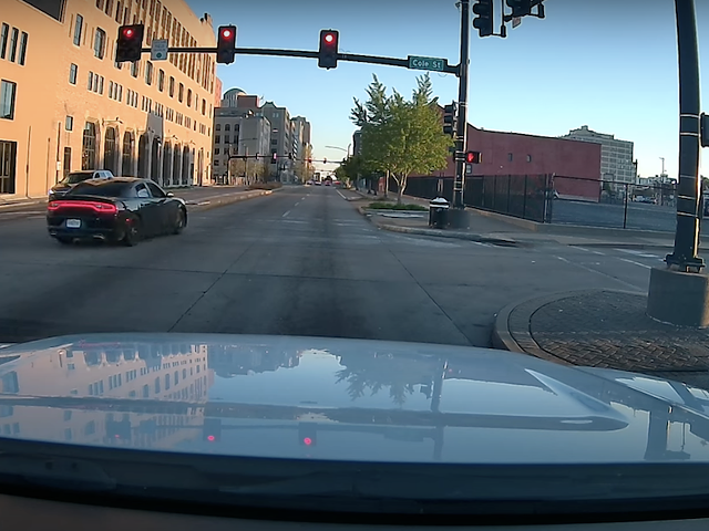 Red light means stop ... yet the cars kept coming.