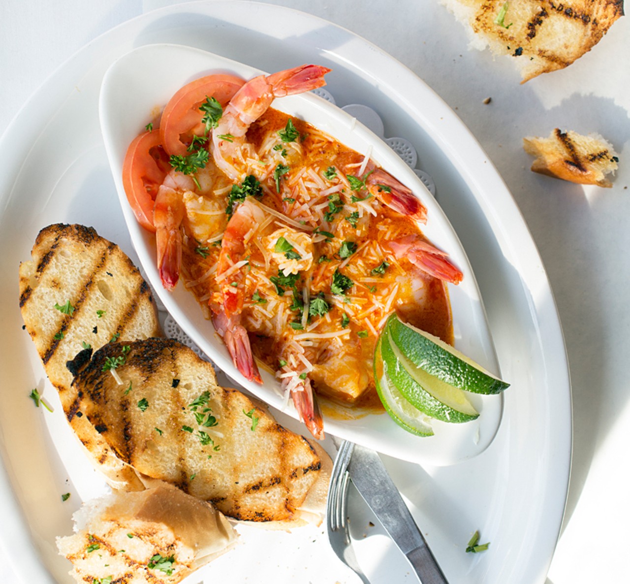 The "Tabasco Butter Shrimp" are Gulf shrimp smothered in rich Tabasco sauce with French bread and lime.