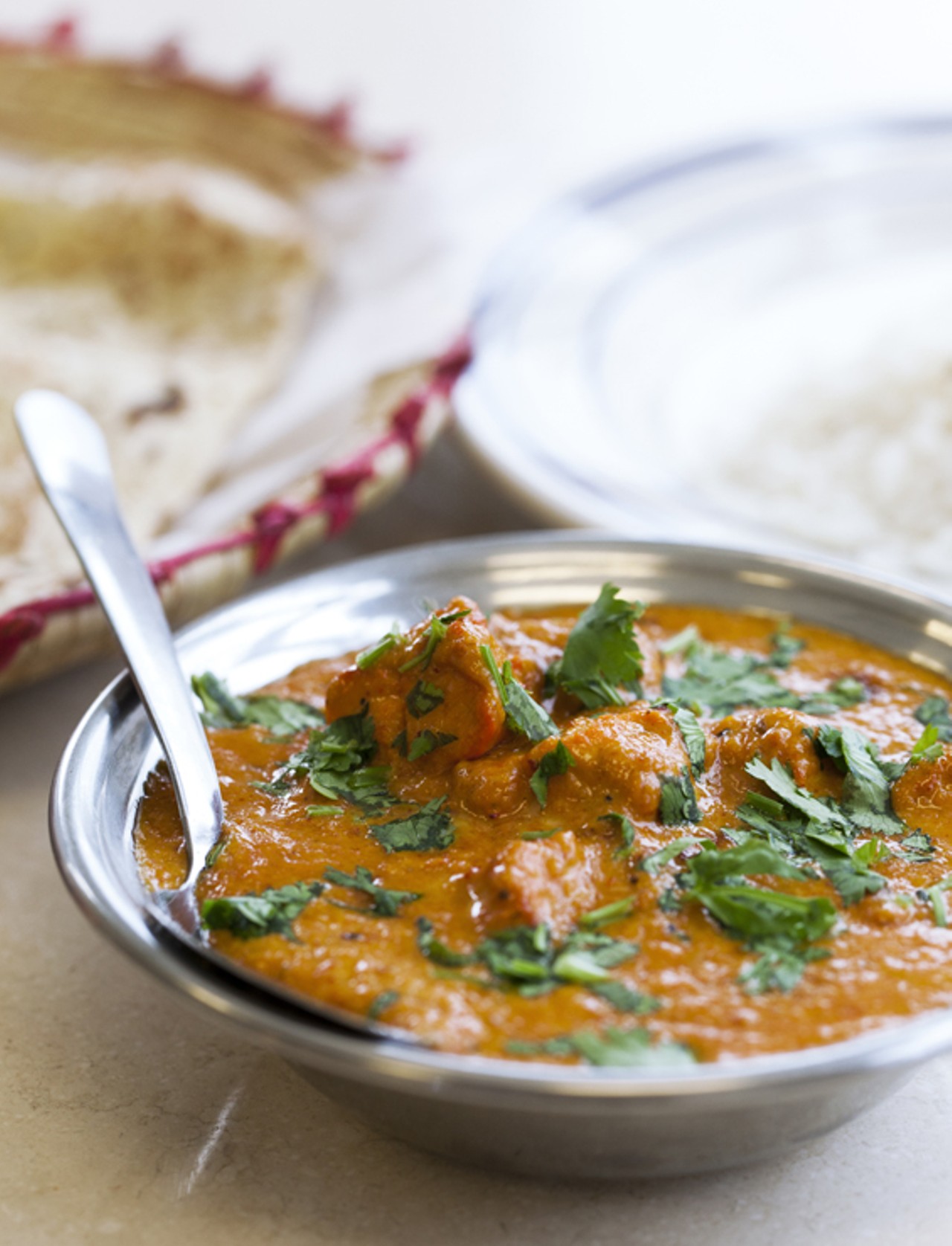 Chicken Tikka Masala - chicken cooked in curry, tomatoes and spices.