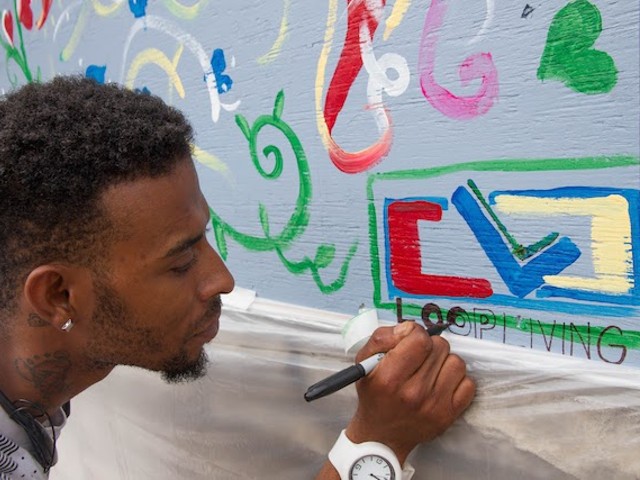 Jomar Jackson paints at Loop Living. If you're an artist having an impact on your community, we want to hear about it.