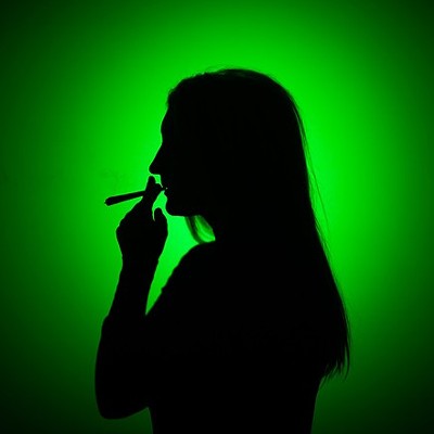 Image of woman smoking reefer