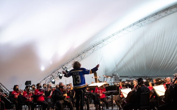 The St. Louis Symphony Orchestra performs at Art Hill.
