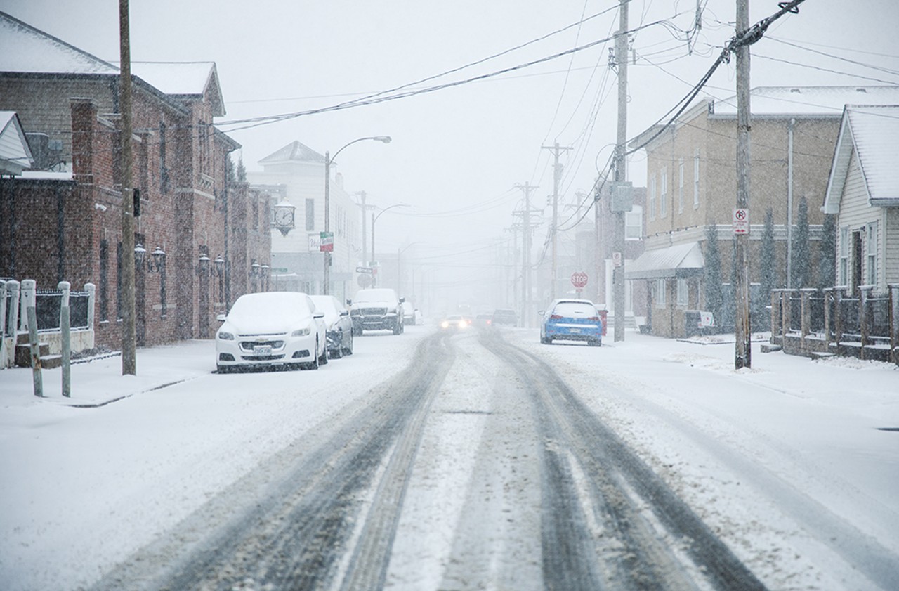 Snow falls over the Hill neighborhood on Friday, Feb. 16, 2024.