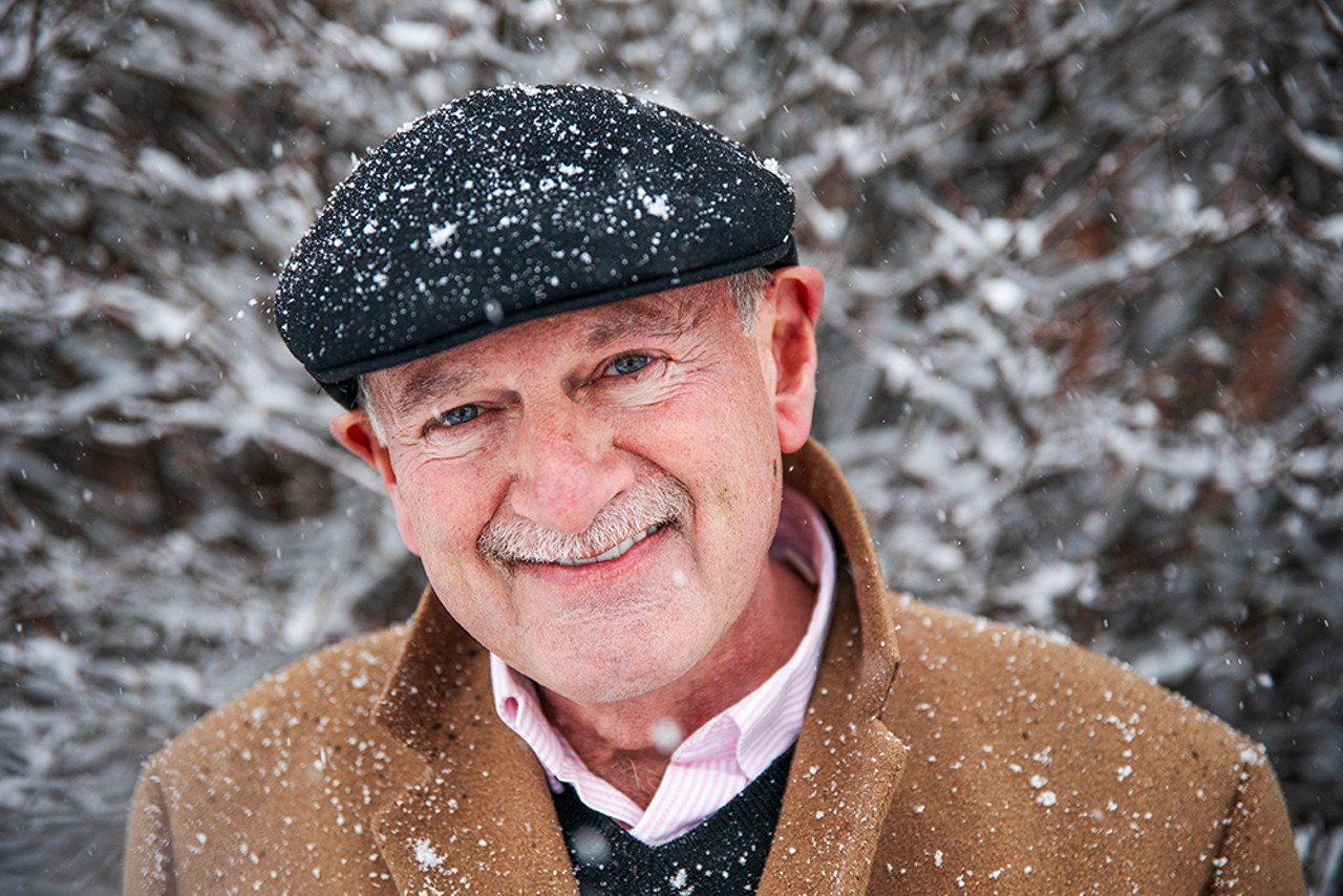 Rocky Tucker stands for a portrait as snow falls over the Hill neighborhood on Friday, Feb. 16, 2024.