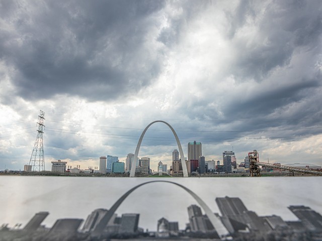 Storm clouds form over the Gateway Arch on Wednesday, March 13, 2024, at the Malcolm W. Martin Memorial Park in East St. Louis, Illinois.