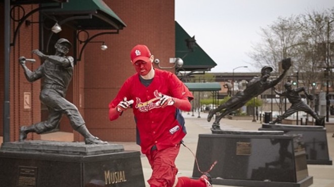 The Rally Runner, shown in a file photo making his customary trek around Busch Stadium, attended the "Stop the Steal" rally in Washington, D.C., on January 6.