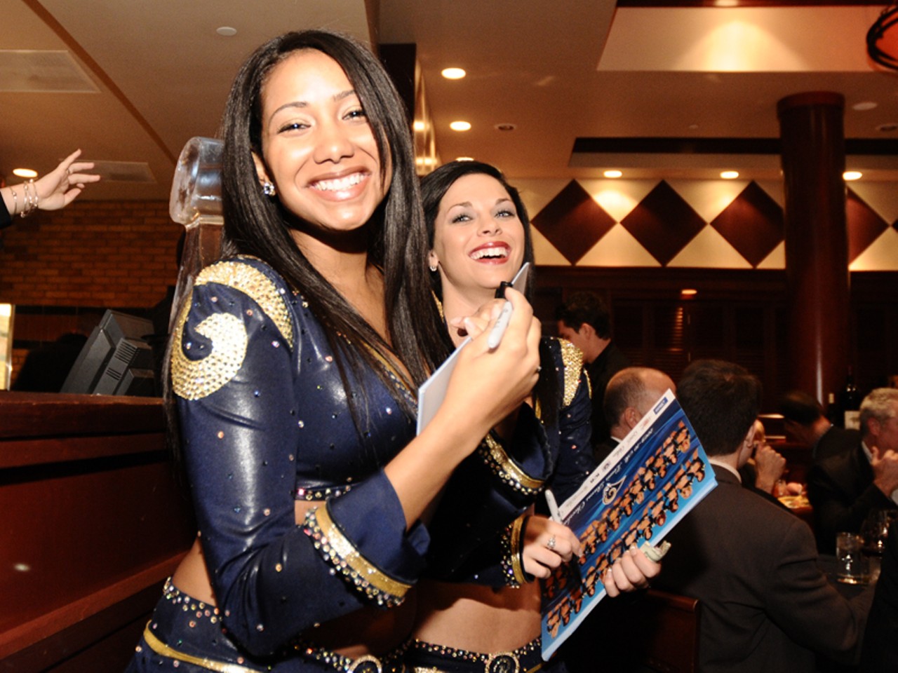 The life of a Rams cheerleader isn't all sequined outfits and Sharpie markers, there's also a lot of smiling involved.