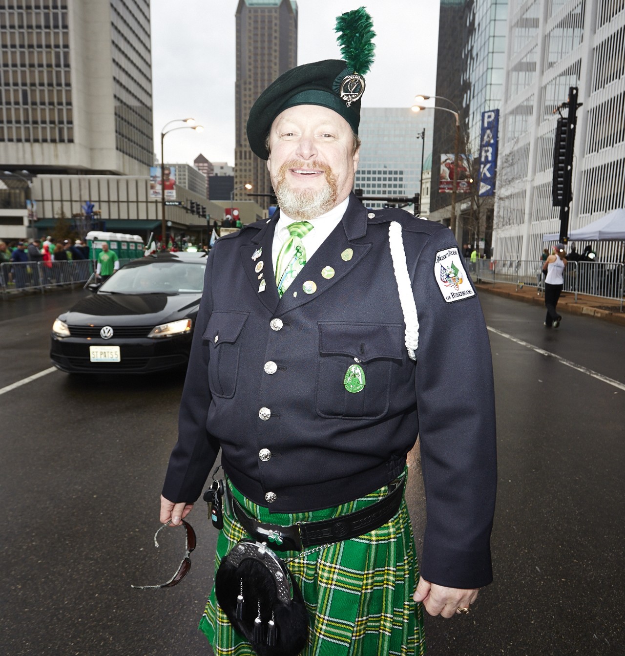 Mike Quinn with the Ancient Order of Hibernians oversees the beginning of the race at the 37th Annual St. Patrick's Day Parade Run in downtown St. Louis on March 14, 2015.