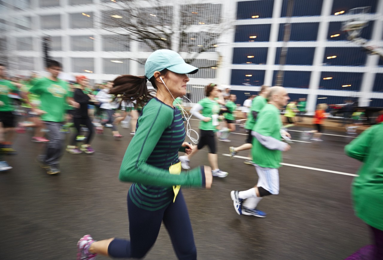 A runner at the 37th Annual St. Patrick's Day Parade Run in downtown St. Louis on March 14, 2015.