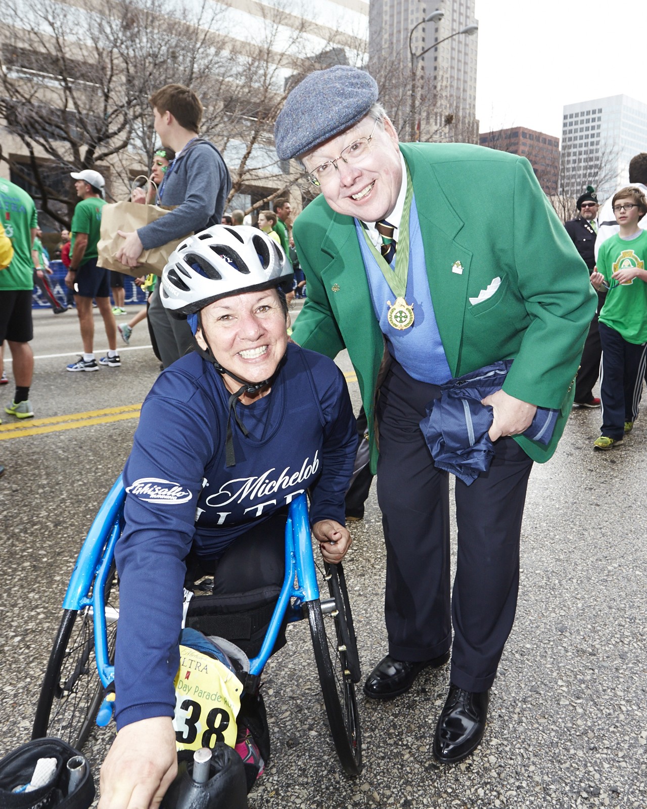 Sandy Daily and Tim Brady pose for a photo post race at the 37th Annual St. Patrick's Day Parade Run in downtown St. Louis on March 14, 2015.
