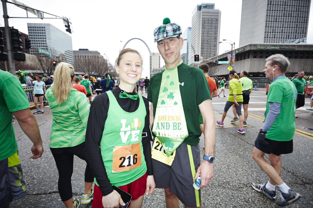 Runners Katy Bryant and Scott Black pose with their fancy ties at the 37th Annual St. Patrick's Day Parade Run in downtown St. Louis on March 14, 2015.
