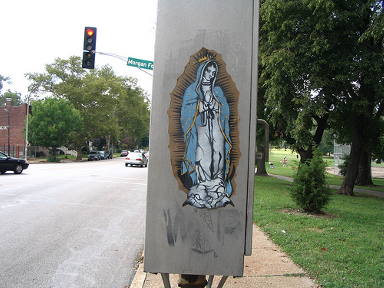 "Our Lady of Tower Grove" at Morgan Ford Road and Arsenal Street. Read State of Street Art: Vandalism or legit, it's not going away by Keegan Hamilton.
