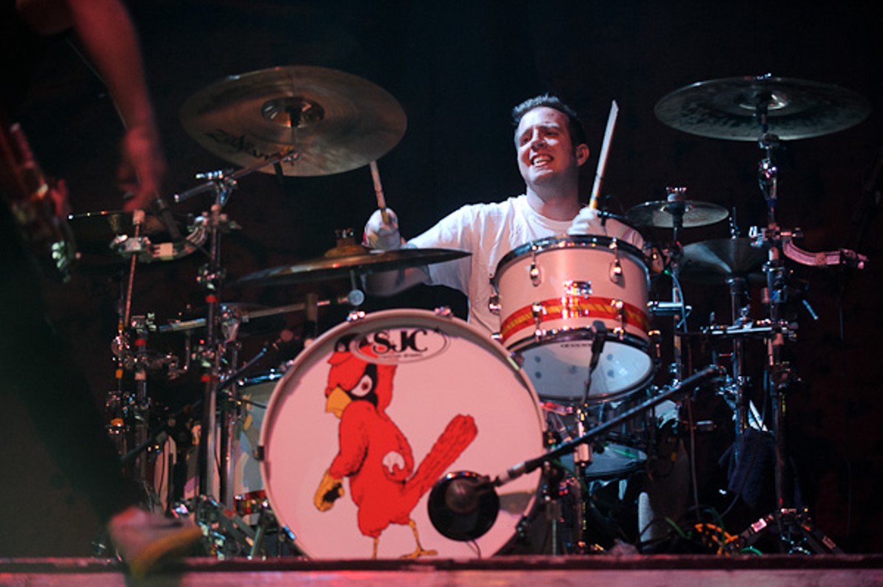 The drummer shows off that St. Louis redbird red.