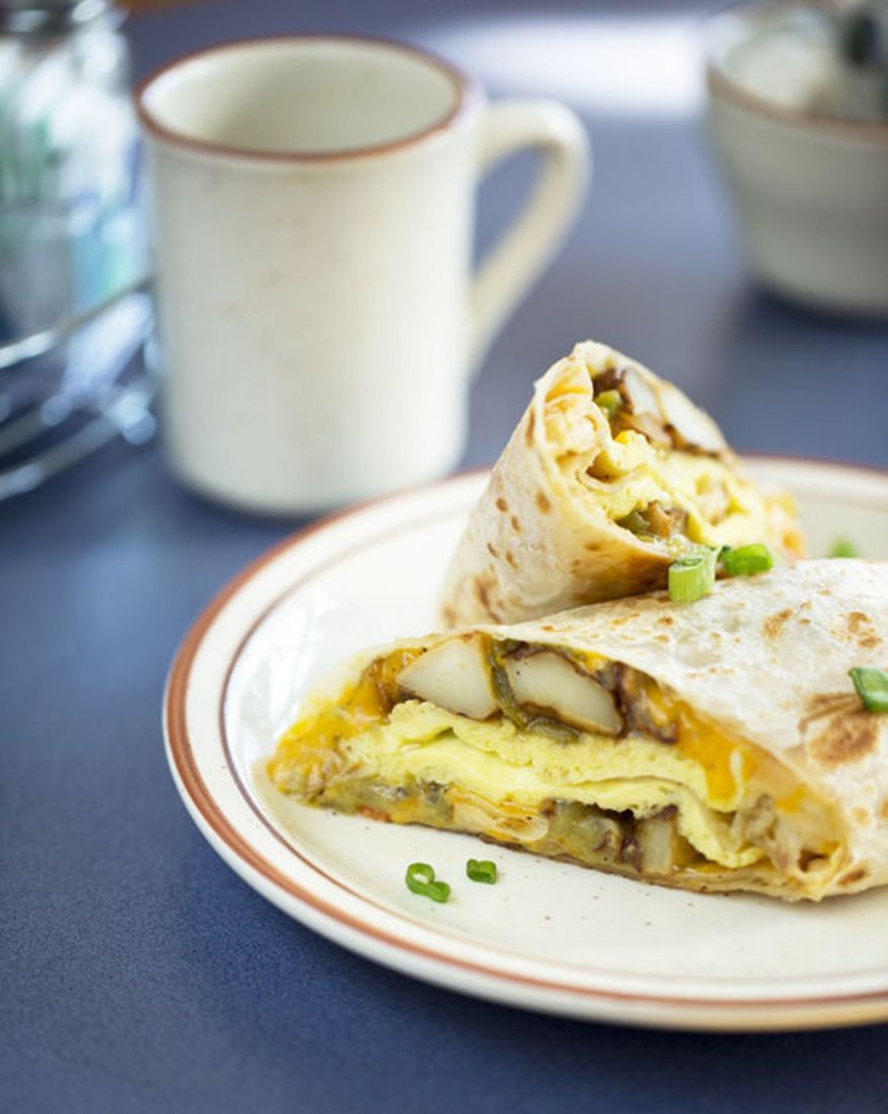 We also recommend Southwest Diner's New Mexican Breakfast Burrito, a flour tortilla stuffed with scrambled eggs, green chile, cheese and home fries. For some extra flair (and $2 more), add calabacitas, chorizo, ham, sausage, bacon or turkey bacon. You can also get it covered with green or red sauce. If your hungover self can't make decisions, ask for "Christmas," which is half of each sauce. Photo by Jennifer Silverberg.